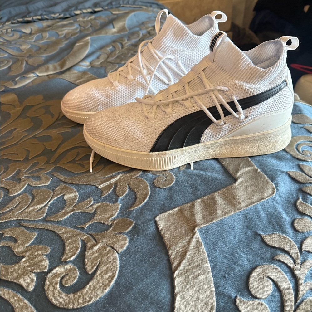 White and Black Puma High-Top Sneakers